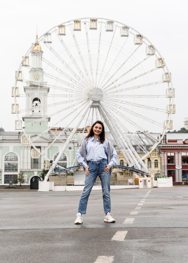 front-view-woman-posing-amusement-park_23-2148693073